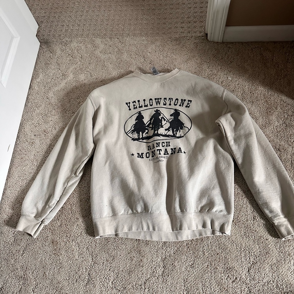 Beige Yellowstone crew neck. From a small boutique in town. Size large.